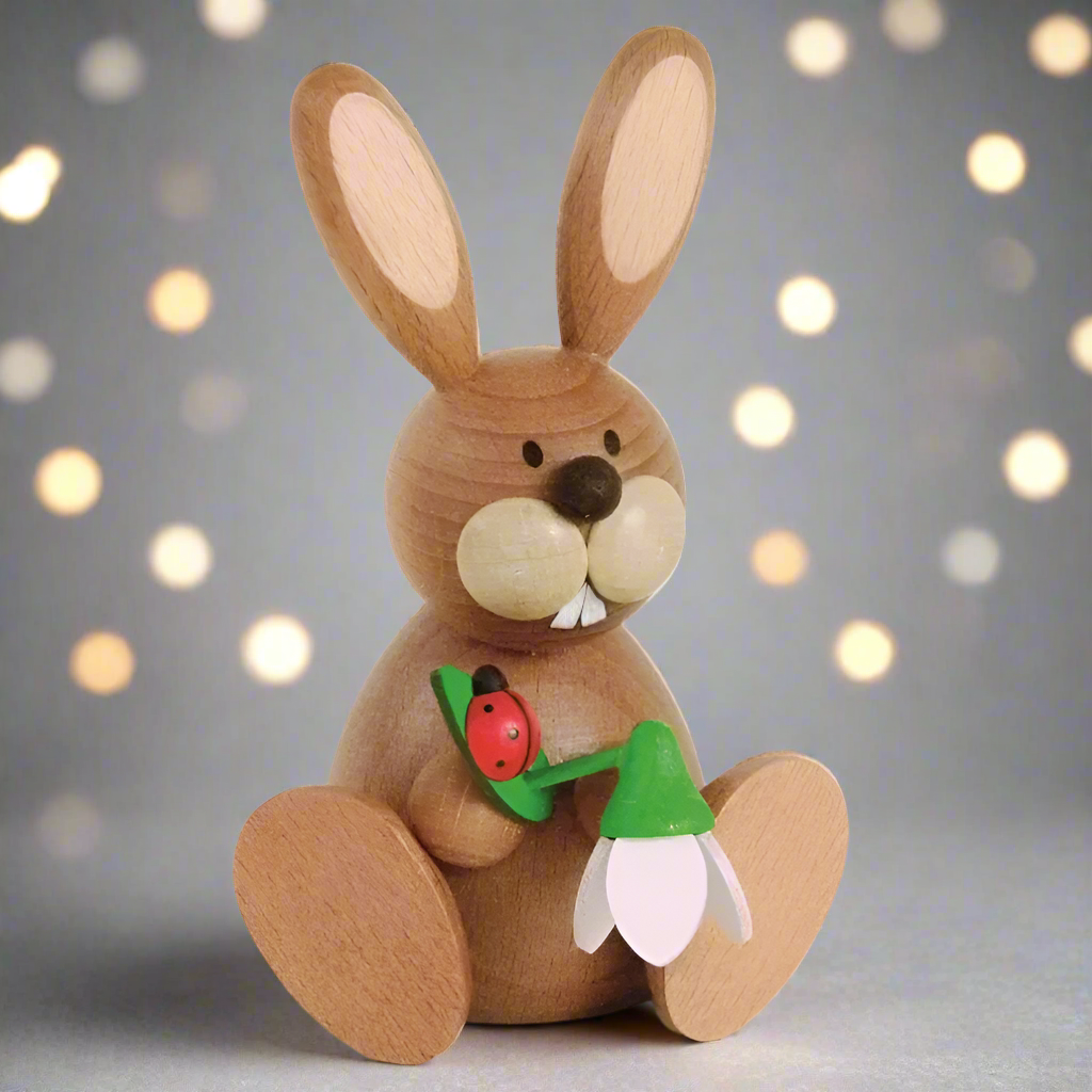 Osterhase Collectible - Bunny Girl Sitting with Snowdrop and Ladybeetle